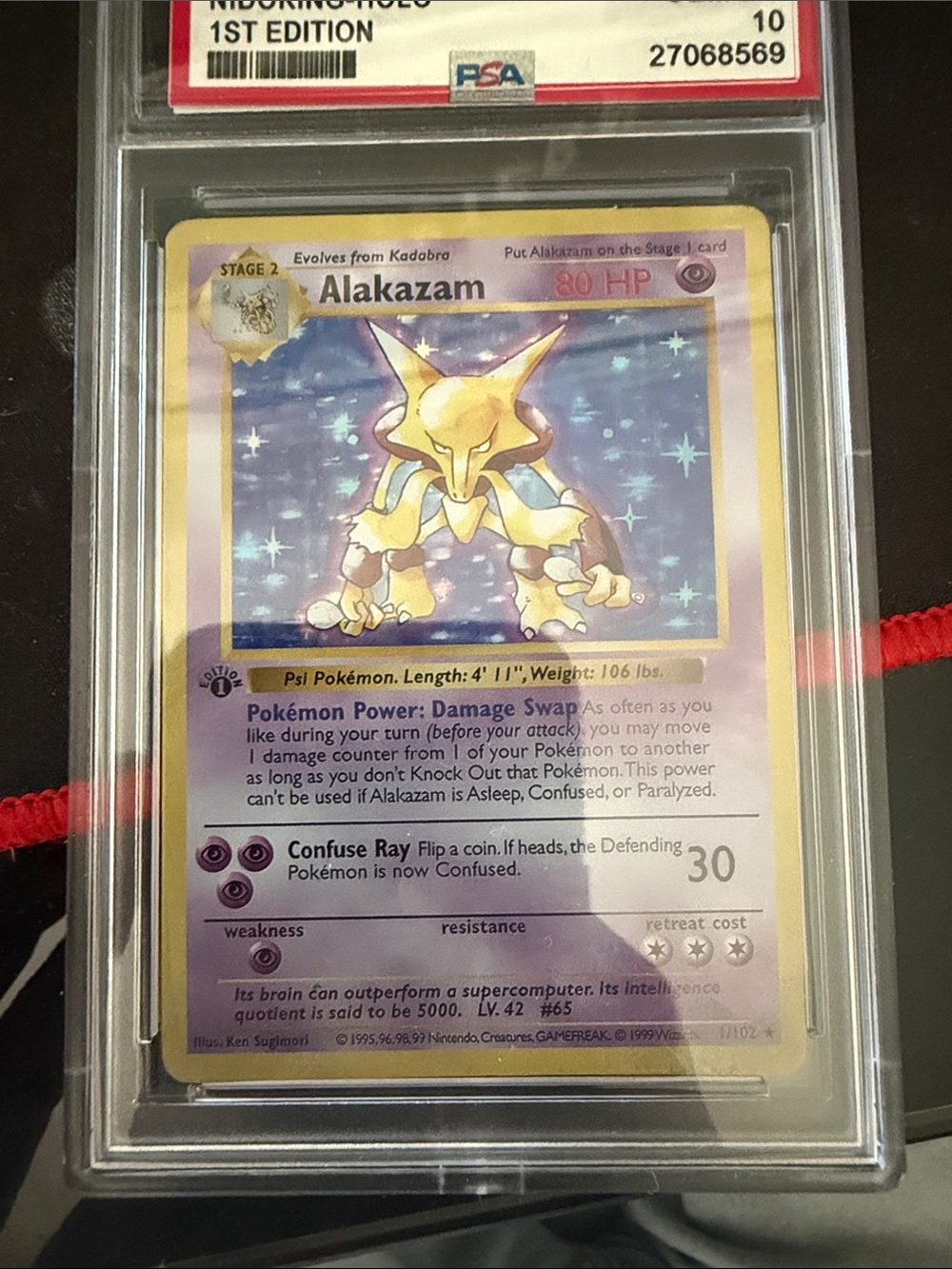 1:1 Alakazam Pokémon Trading Card - Yellow/Purple